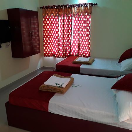 Hotel Ganga Residency Kuzhittura Buitenkant foto
